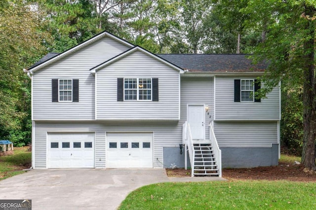 raised ranch featuring a garage