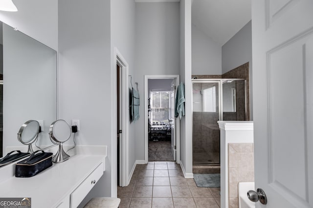 bathroom featuring high vaulted ceiling, vanity, an enclosed shower, and tile patterned floors