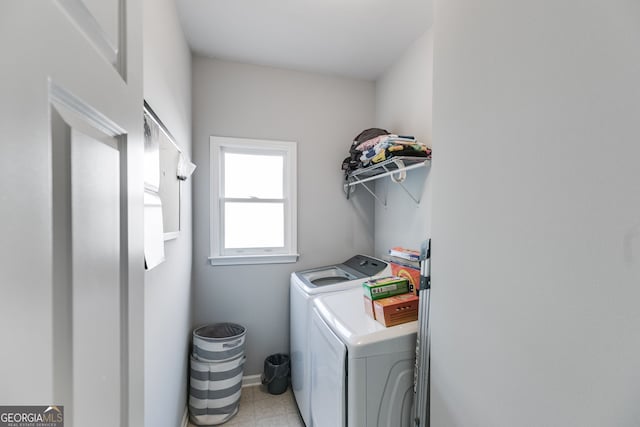 laundry room featuring separate washer and dryer