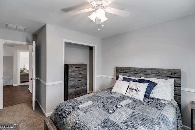 carpeted bedroom featuring ceiling fan