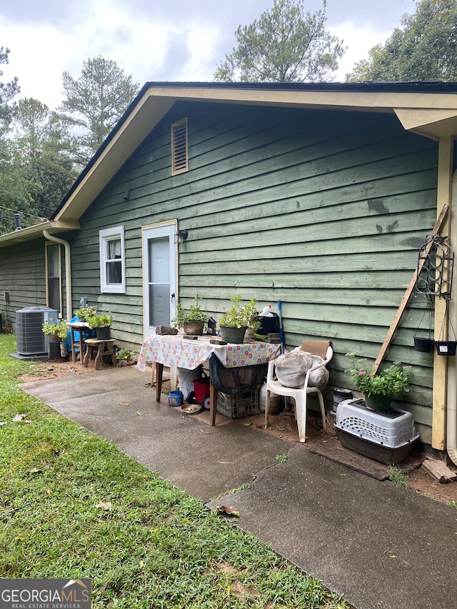 exterior space featuring central air condition unit