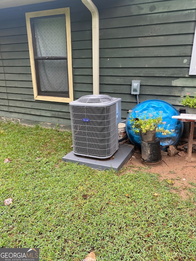 exterior details featuring central AC unit