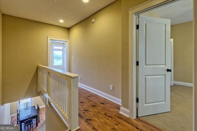 hallway featuring hardwood / wood-style floors