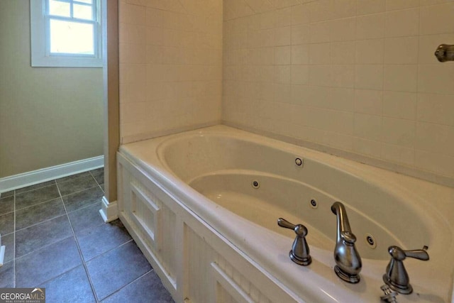 bathroom featuring a tub and tile patterned floors