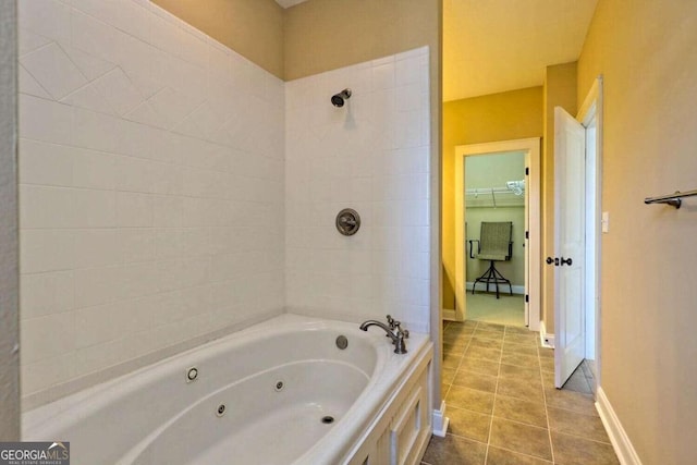 bathroom with tile patterned floors