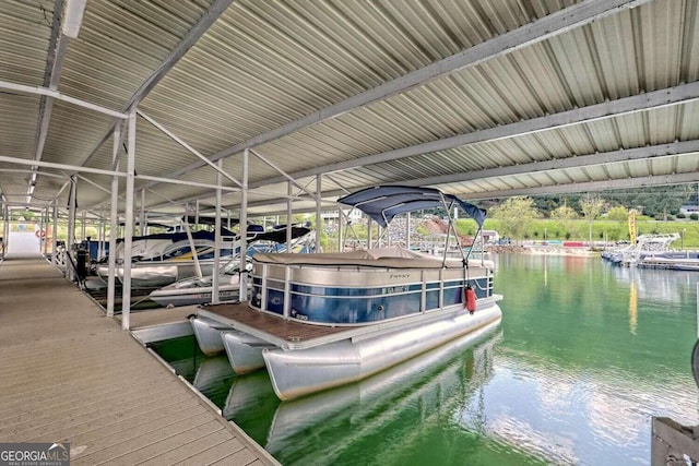 dock area featuring a water view