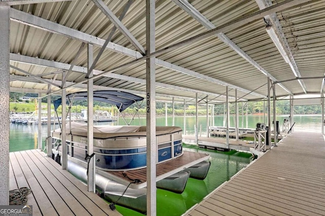 dock area featuring a water view