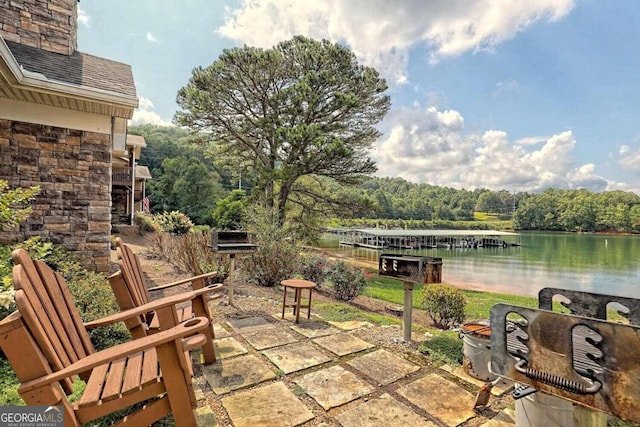 view of patio / terrace with a water view