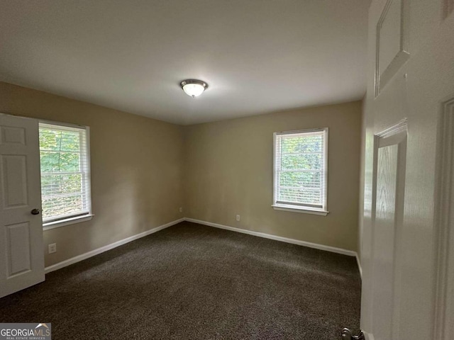 view of carpeted spare room