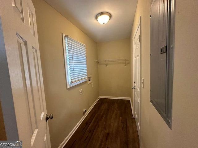 corridor with dark wood-type flooring