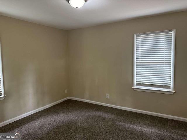 view of carpeted spare room