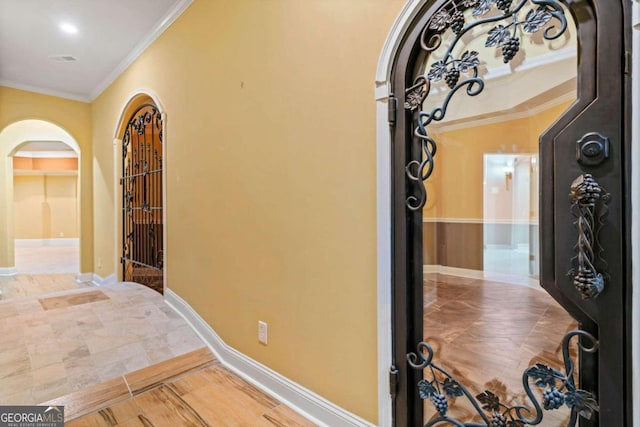 hall featuring crown molding