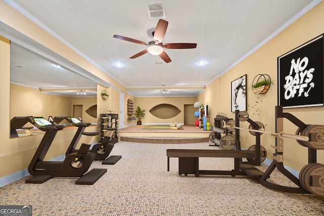 workout room featuring ornamental molding and ceiling fan