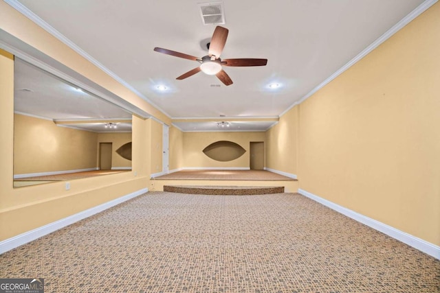 unfurnished living room featuring ceiling fan, carpet flooring, and crown molding