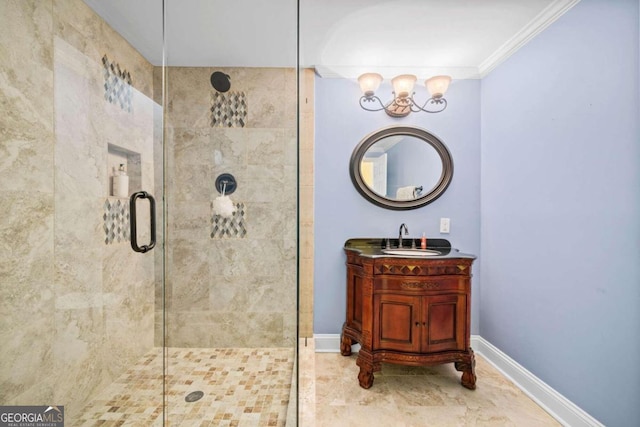 bathroom featuring vanity, a shower with shower door, and crown molding