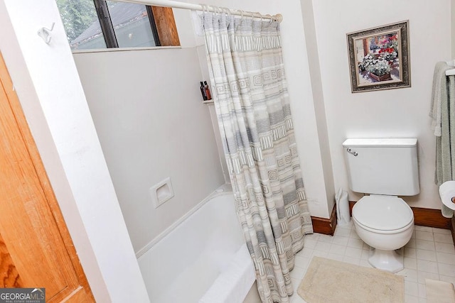 bathroom with toilet and shower / bathtub combination with curtain