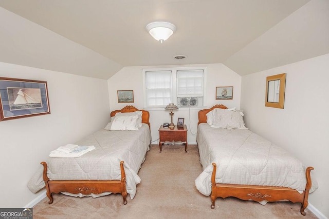 bedroom with light carpet and lofted ceiling