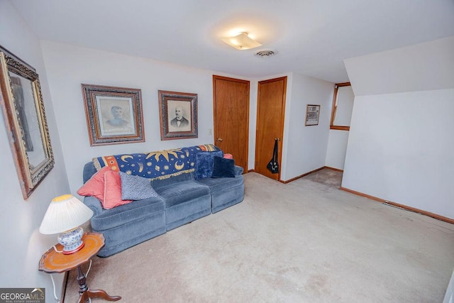 living room with light colored carpet