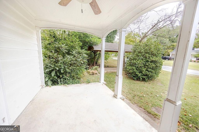 view of patio featuring ceiling fan