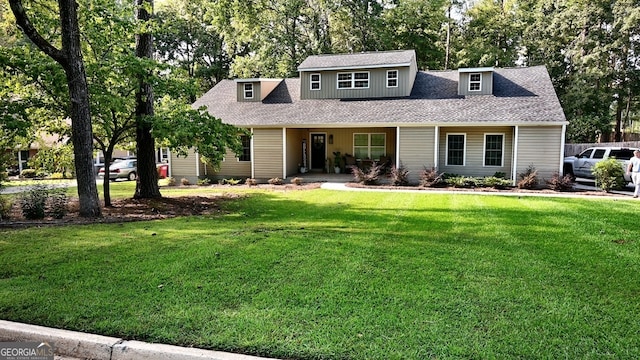 view of front of home with a porch and a front lawn