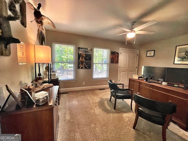 office area with carpet flooring and ceiling fan