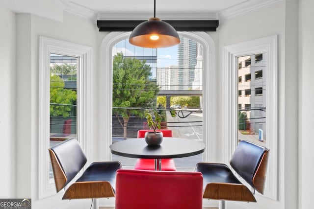 dining room with crown molding