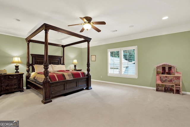 carpeted bedroom featuring ceiling fan and ornamental molding