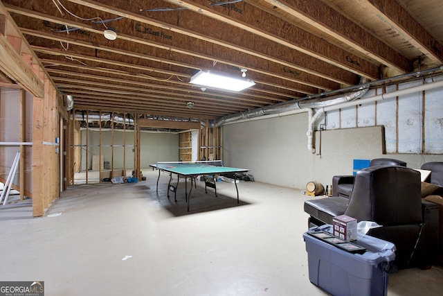 rec room with concrete floors and pool table