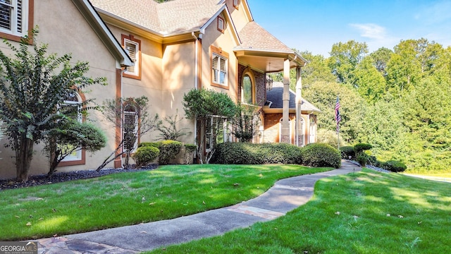 exterior space with a lawn