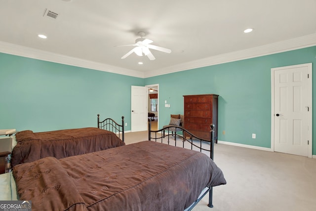 bedroom featuring ceiling fan, ornamental molding, and carpet floors