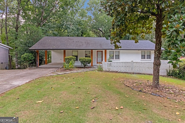 single story home with covered porch and a front lawn