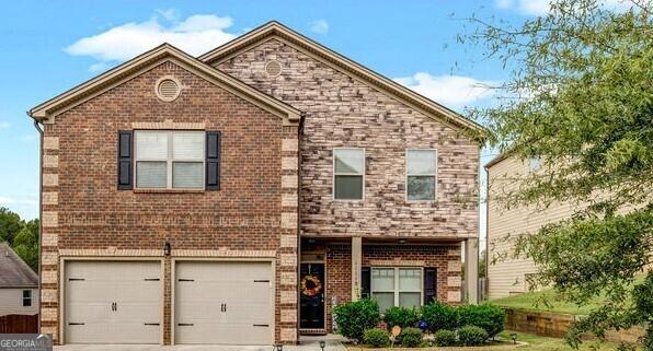 front facade featuring a garage