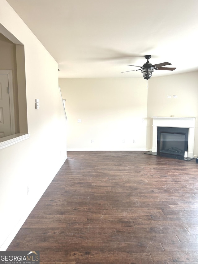 kitchen featuring light wood-type flooring, black appliances, hanging light fixtures, and a center island