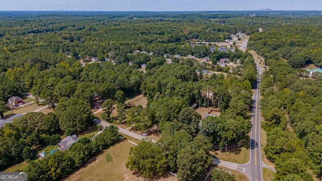 3060 Orchard Rd SW, Conyers, GA 30094 - aerial view of property's location featuring a heavily wooded area