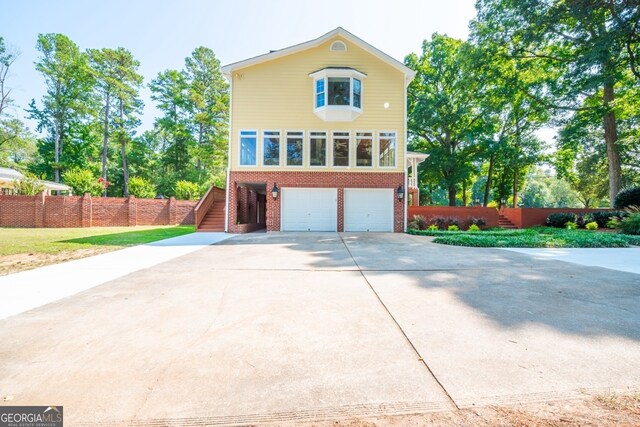 front facade with a garage