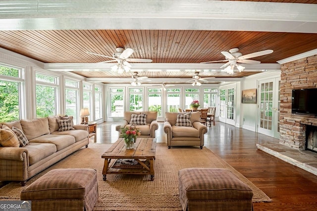 3060 Orchard Rd SW, Conyers, GA 30094 - living area featuring wooden ceiling, wood finished floors, ceiling fan, french doors, and a stone fireplace