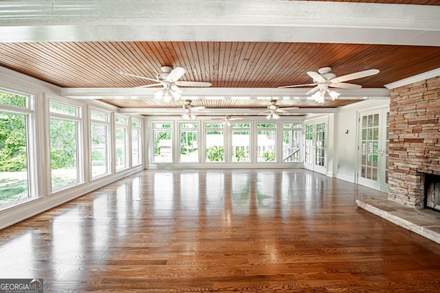 3060 Orchard Rd SW, Conyers, GA 30094 - unfurnished living room featuring ceiling fan, wooden ceiling, french doors, wood finished floors, and a stone fireplace