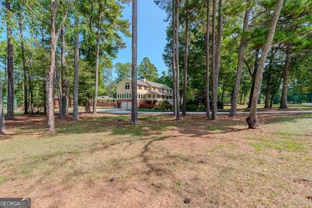 3060 Orchard Rd SW, Conyers, GA 30094 - view of green lawn with view of wooded area