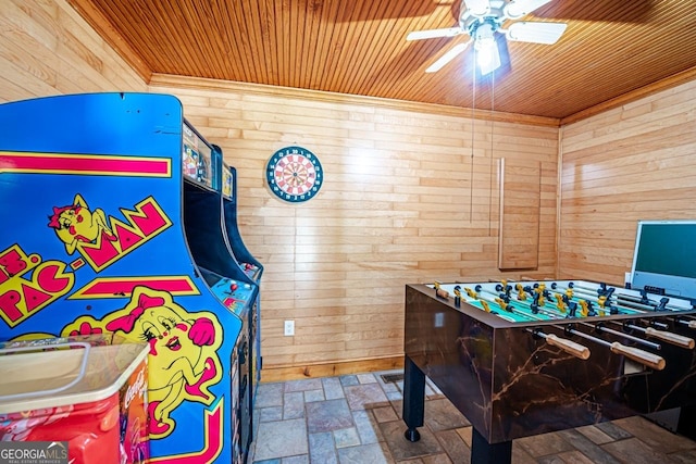 3060 Orchard Rd SW, Conyers, GA 30094 - recreation room featuring wooden walls, wooden ceiling, a ceiling fan, and stone finish flooring