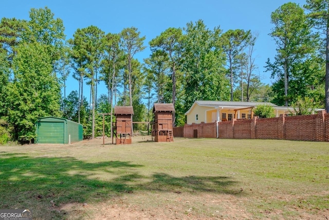 3060 Orchard Rd SW, Conyers, GA 30094 - view of yard featuring a playground and an outdoor structure
