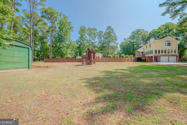 view of yard with a garage