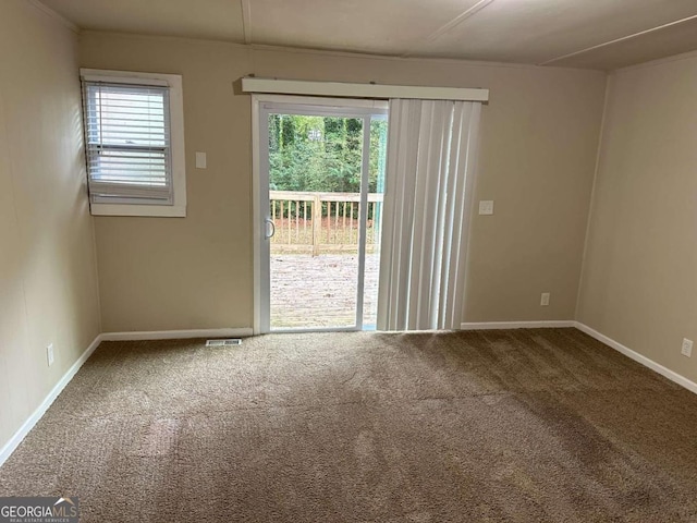 3188 Convair Ln, Decatur, GA 30032 - carpeted spare room featuring visible vents and baseboards