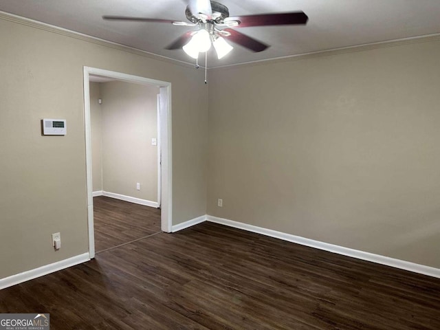 unfurnished room with ornamental molding, dark wood-type flooring, and ceiling fan