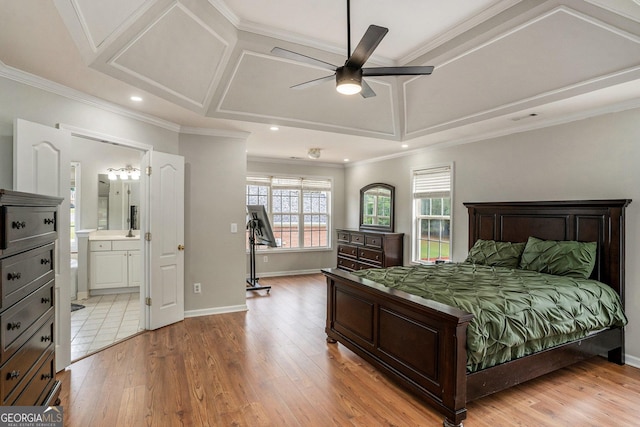 bedroom with ensuite bathroom, ceiling fan, ornamental molding, and light hardwood / wood-style floors