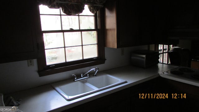 kitchen featuring plenty of natural light and sink