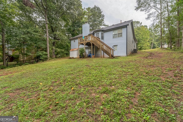 view of yard with a wooden deck