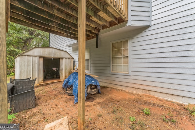 view of patio / terrace with a storage shed