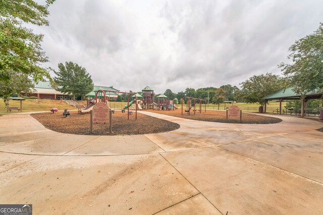 surrounding community with a playground and a gazebo