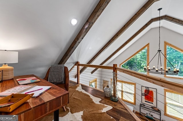 office featuring hardwood / wood-style floors, lofted ceiling with beams, and a chandelier