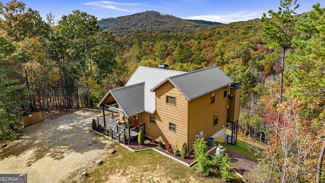 birds eye view of property featuring a mountain view